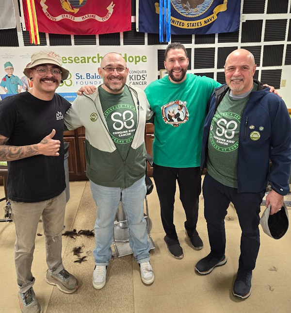 Brad Riccillo along with his father Deacon Ed Riccillo pose for a picture along the Band of Barbers and Amenity Barber, Bobby Sanchez and Reese Cambo, respectively.